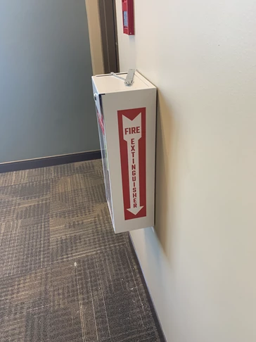  Highly visible signs that clearly mark the location of fire extinguishers.